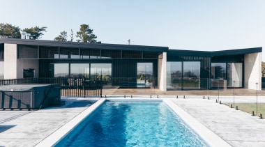 Drawing inspirations from robust farm building materials, concrete 