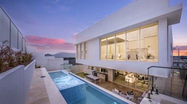 A bespoke, multi-level pool area forms part of 