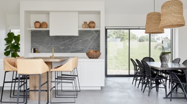 Light-toned concrete floors in the living areas are 