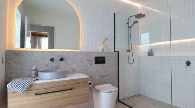This ensuite bathroom, designed by Sophia Cole, embodies 