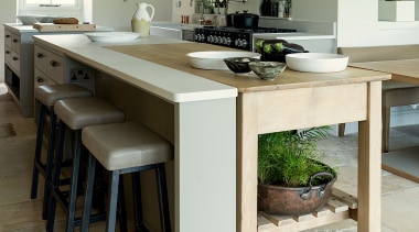 A vintage baker’s table and breakfast bar both 