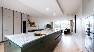 Poggenpohl cabinetry in Pine Green metallic gloss lacquer 