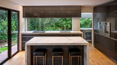 The island in this kitchen was designed without 