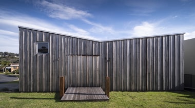 The upstairs entry disappears into the woodwork – 