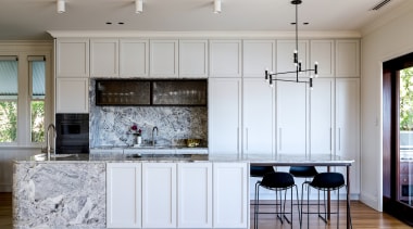 Boasting softly curved acid etched Ash Marble on 