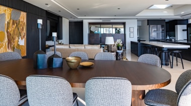 Dark wall treatments balance the dramatic black and 