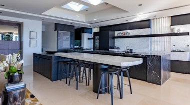 The kitchen offers lots of bench space and 