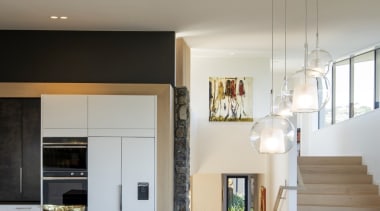 The homeowners wanted a functional, uncluttered kitchen which 