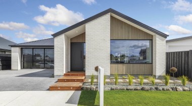 Street smart with pale brick cladding and prominent 