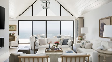 White upholstery with subtle accents play off the 