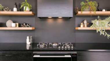 Bold kitchen features Fisher & Paykel appliances - cabinetry, countertop, floor, flooring, furniture, interior design, kitchen, kitchen stove, living room, material property, room, shelf, stove, table, tile, wall, gray, black