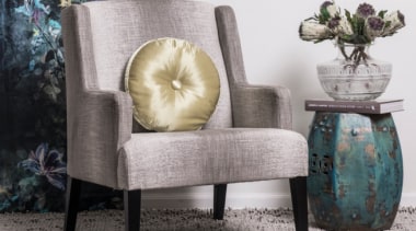 Getting the balance is crucial when designing for chair, club chair, coffee table, couch, end table, furniture, interior design, living room, plant, room, table, gray