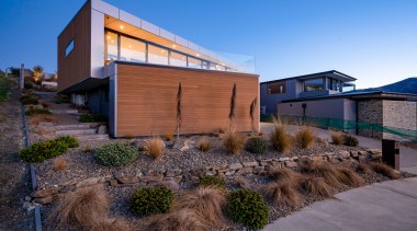 The landscaping at the front of the home. 