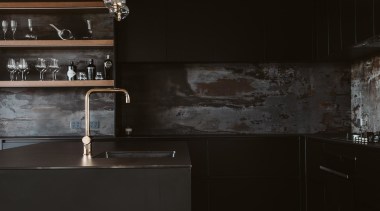 Slender Dekton benchtops are a feature of this architecture, black, black-and-white, building, ceiling, design, floor, flooring, furniture, hardwood, house, interior design, light, line, material property, room, table, wall, wood, black, gray