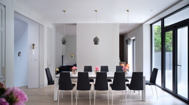 The interior palette utilises a mix of whites, 