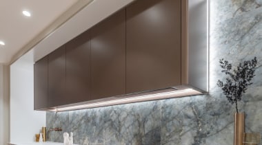 The veining in the marble splashback connects with 