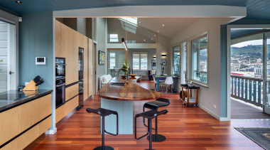 The kitchen is centrally placed, with access to 