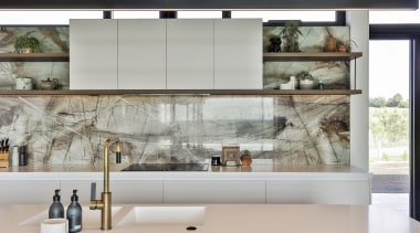 Floating shelves were introduced to create a more 