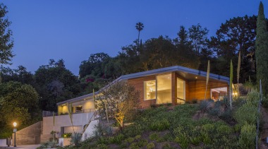 At night, the large windows invite you in architecture, cottage, estate, facade, home, house, landscape, lighting, plant, property, real estate, residential area, roof, sky, suburb, tree, villa, blue