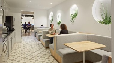 The design for renowned advertising agency Wieden+Kennedy moves furniture, interior design, lobby, gray