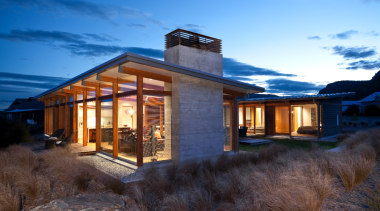 Situated on a plateau above a river, this architecture, cloud, cottage, estate, evening, facade, home, house, landscape, log cabin, mountain, property, real estate, residential area, siding, sky, winter, black