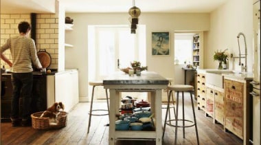 The cream Smeg fridge looks great in this floor, flooring, furniture, hardwood, home, interior design, living room, room, table, wood, wood flooring, white, brown