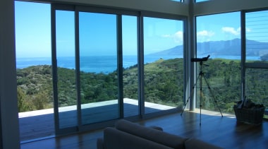 Bush and sea views. - Amodea Bay - apartment, condominium, daylighting, door, glass, home, interior design, penthouse apartment, property, real estate, sky, window, black, teal