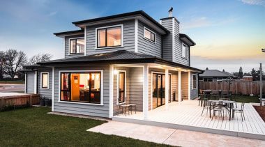 A new home clad with Envira Weatherboard System cottage, elevation, facade, home, house, property, real estate, residential area, siding, window, white