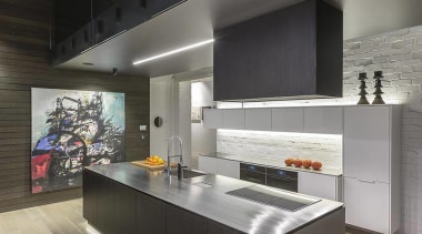 The clients wanted strong design that wouldn't detract architecture, countertop, floor, interior design, kitchen, table, gray, black