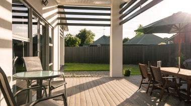 TimberTech decking is imported from the United States house, interior design, outdoor structure, patio, real estate, roof, black