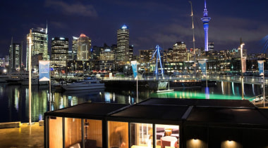 Samsung Electronics New Zealand has revealed its Home city, cityscape, downtown, marina, metropolis, metropolitan area, night, reflection, sky, skyline, skyscraper, tourist attraction, tower block, water, black, blue
