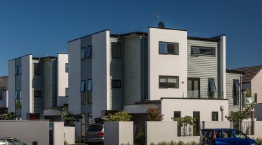 Weatherboards deliver a unique look to any commercial apartment, architecture, building, commercial building, condominium, corporate headquarters, elevation, facade, home, house, metropolitan area, mixed use, neighbourhood, property, real estate, residential area, sky, suburb, blue, gray, black