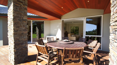 Pitched roof lined with cedar covers this outdoor dining room, estate, interior design, patio, property, real estate