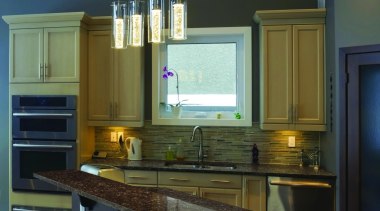 Earth and fire is represented in the color cabinetry, countertop, interior design, kitchen, room, under cabinet lighting, black, brown