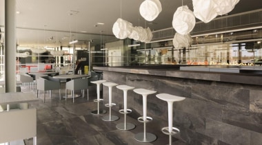 Stunning natural stone large format tiles reproduced in interior design, gray, black