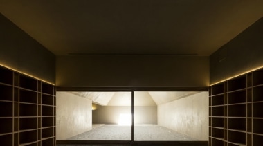 The interior has a dream-like quality thanks to architecture, ceiling, daylighting, interior design, light, lighting, wall, black