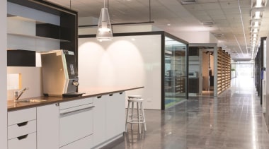 A modern coffee station featuring a Hideaway Soft cabinetry, countertop, floor, flooring, interior design, kitchen, gray