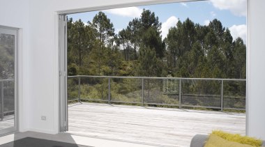 The ultimate in indoor outdoor living. - Foldback architecture, balcony, daylighting, door, glass, handrail, house, interior design, property, real estate, window, white