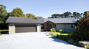 This home is built by Fowler Homes Taranaki.Fowler cottage, estate, facade, home, house, landscape, property, real estate, residential area, roof, siding, yard, white