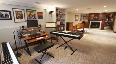 Because of its expansive and wide-open layout, a floor, flooring, hardwood, interior design, keyboard, living room, musical instrument, piano, real estate, room, wood flooring, gray, brown