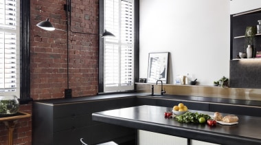 Lights hang out from various points on the countertop, interior design, kitchen, loft, table, black, white