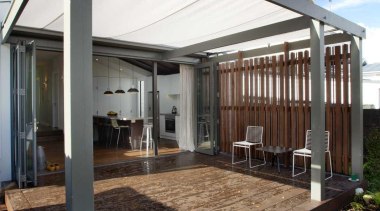 The pergola can be covered ensuring it is facade, house, real estate, roof, structure, black, white