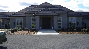 Generously proportioned plaster home built in Canterbury by asphalt, cottage, elevation, estate, facade, home, house, property, real estate, residential area, roof, siding, suburb, window, gray, black, white