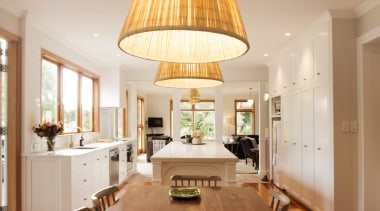 TIDA NZ 2017 – Designer kitchen entrant – ceiling, chandelier, dining room, floor, flooring, hardwood, interior design, laminate flooring, light fixture, lighting, living room, table, wood, wood flooring, orange, brown