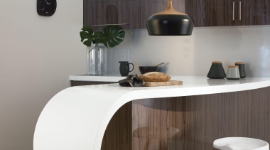 This curvy kitchen features thermoformed Laminex Solid Surface chest of drawers, furniture, interior design, product design, sideboard, table, gray