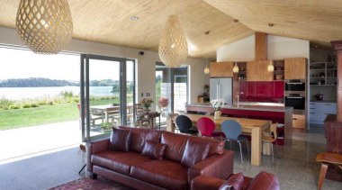 Lounge with red leather couches and hanging light ceiling, estate, home, house, interior design, living room, property, real estate, room, window