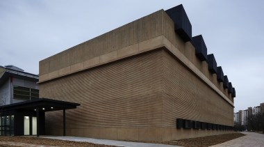 The court certainly has a natural aesthetic - architecture, brutalist architecture, building, corporate headquarters, facade, structure, teal, black