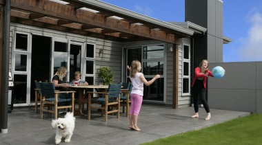 Functional kitchen in award winning 'Bridget' town house backyard, canopy, home, house, outdoor structure, recreation, shed, gray, black