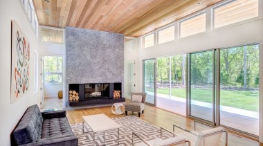 The fireplace is the centre of the open architecture, ceiling, daylighting, estate, floor, home, house, interior design, living room, property, real estate, window, gray