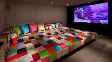 Huge TV screen and humongous couch - Cinema bed sheet, interior design, room, red